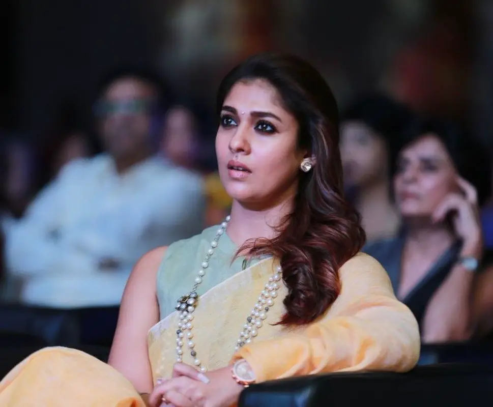 Actress Nayanthara Romantic Stills Tamil Gallery