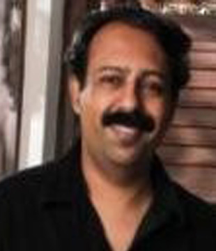 Hindi Program Director Rajesh Advani
