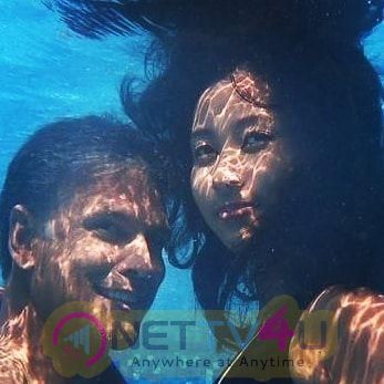  Underwater Pictures Of Model Milind Soman And Ankita Konwar Stunning Pics Hindi Gallery