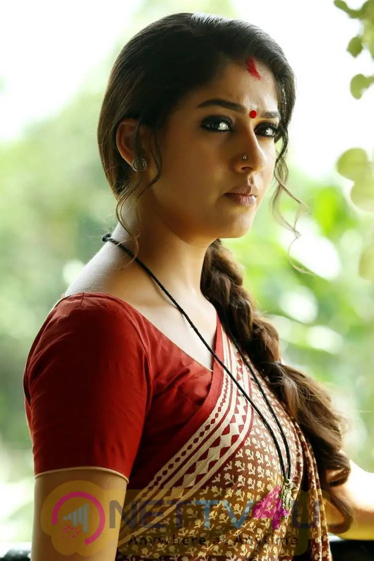 Actress Nayanthara Romantic Stills Tamil Gallery