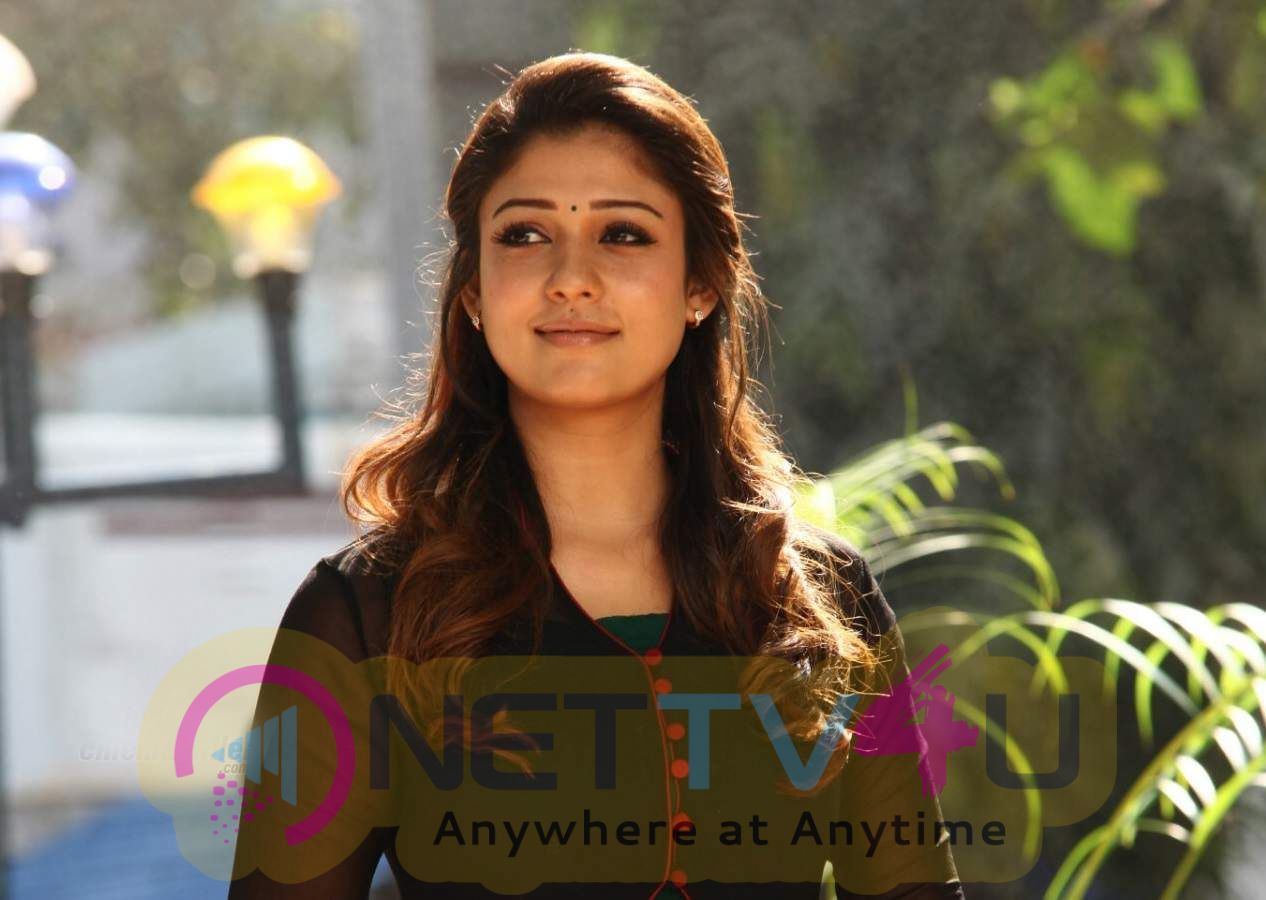 Actress Nayanthara Romantic Stills Tamil Gallery