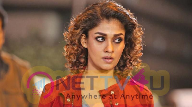 Actress Nayanthara Romantic Stills Tamil Gallery