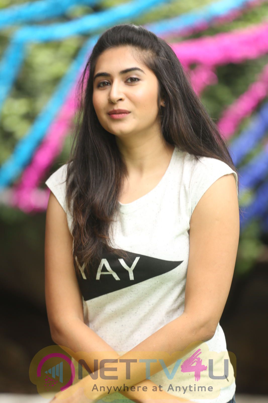 Actress Vyoma Nandi Stills In White T-Shirt Telugu Gallery