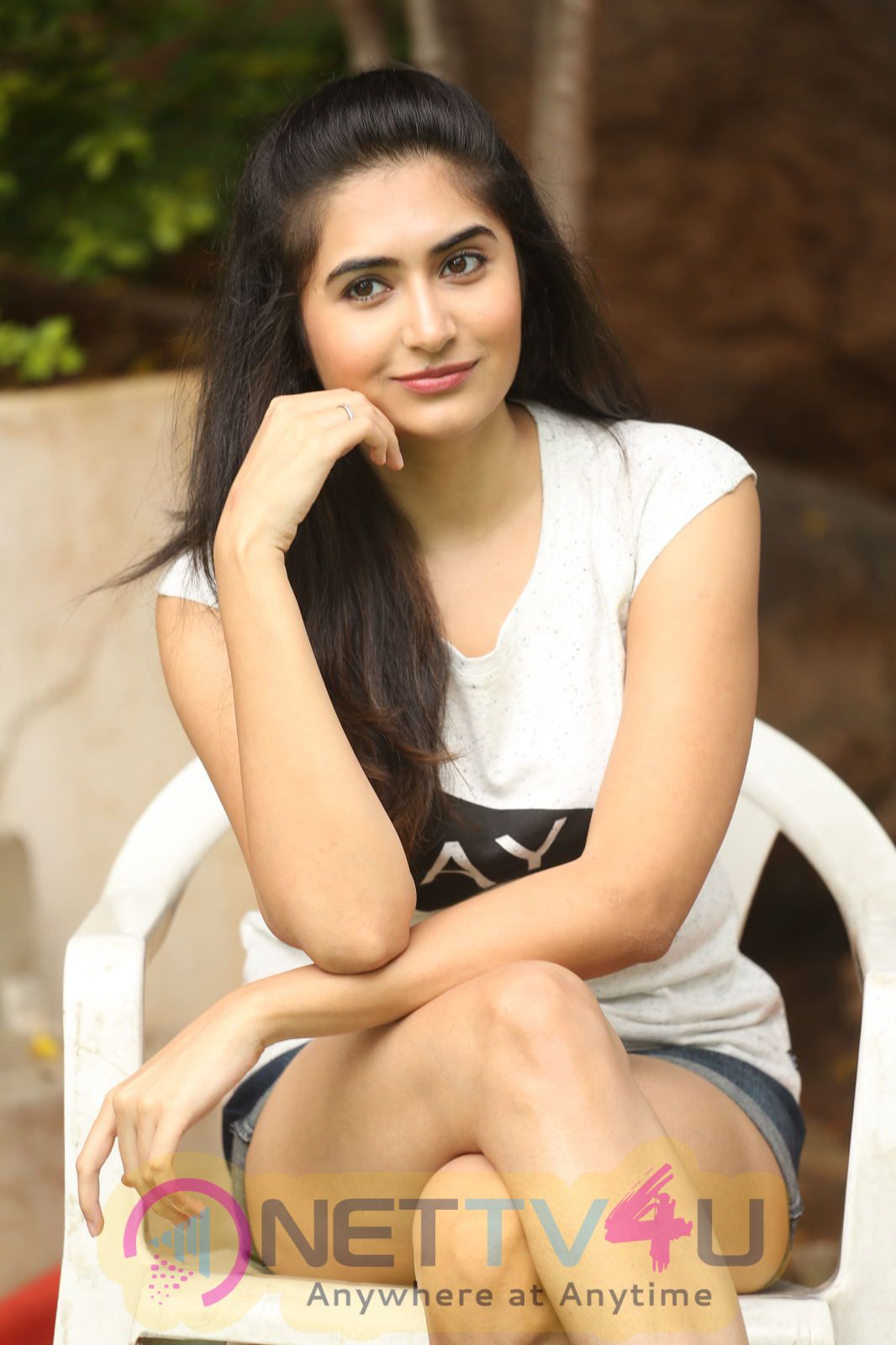 Actress Vyoma Nandi Stills In White T-Shirt Telugu Gallery