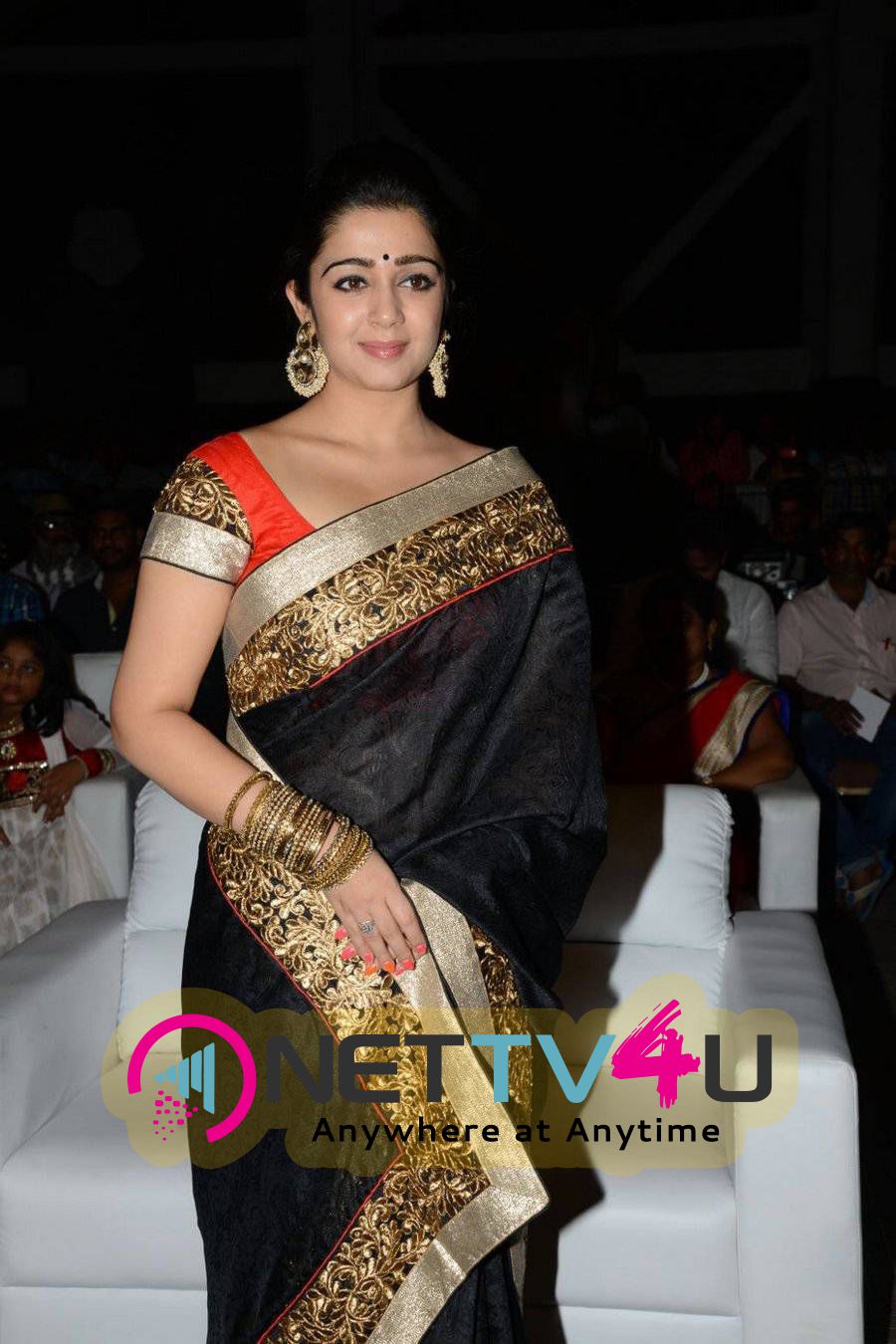 rare pics of actress charmi kaur at jyothi lakshmi movie audio launch 1