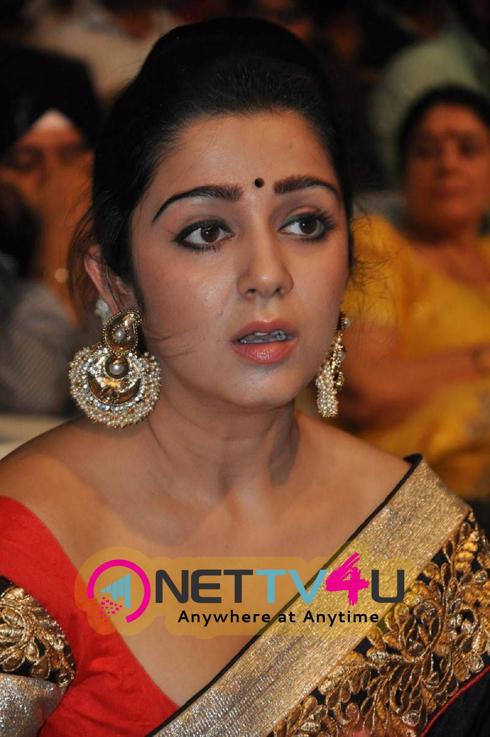 rare pics of actress charmi kaur at jyothi lakshmi movie audio launch 10