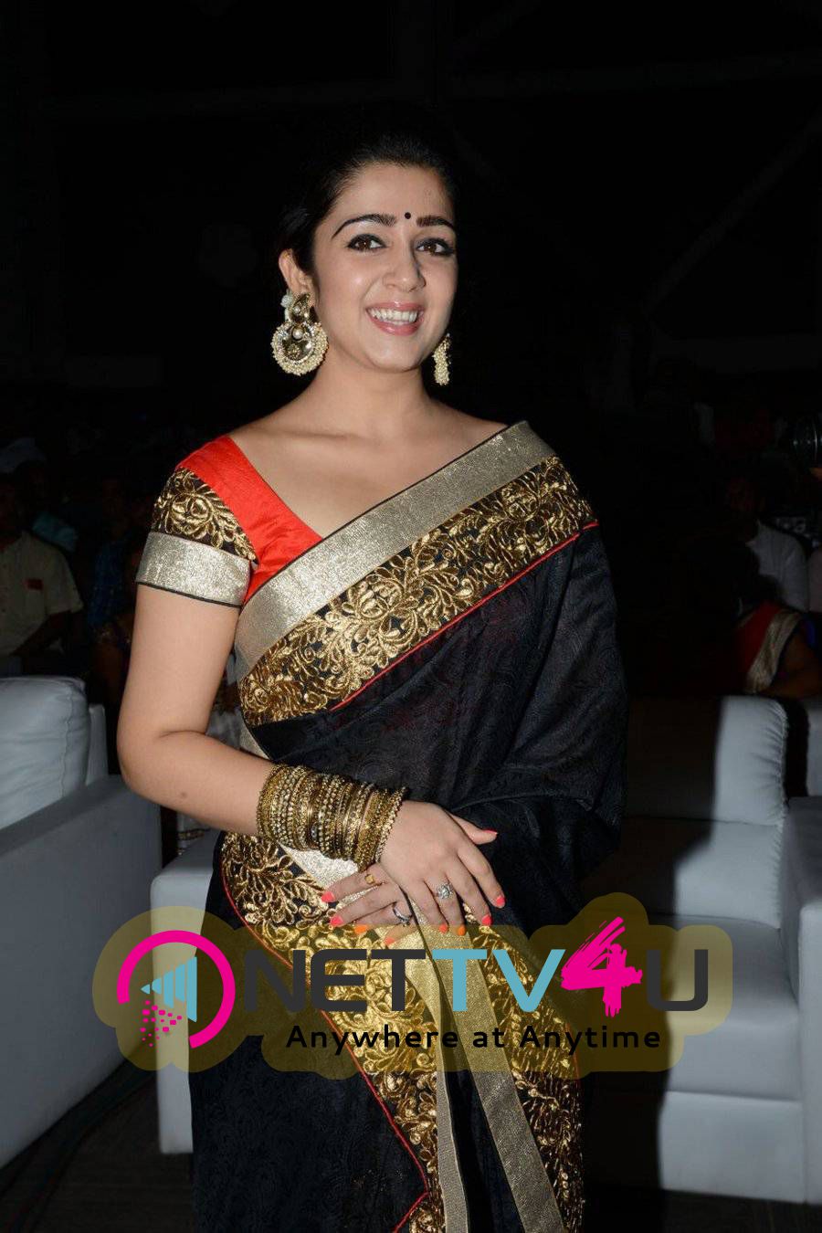 rare pics of actress charmi kaur at jyothi lakshmi movie audio launch 20