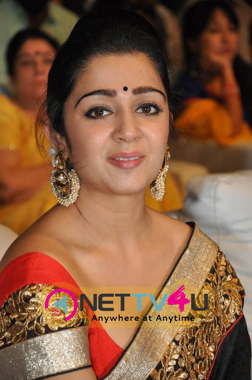 rare pics of actress charmi kaur at jyothi lakshmi movie audio launch 22